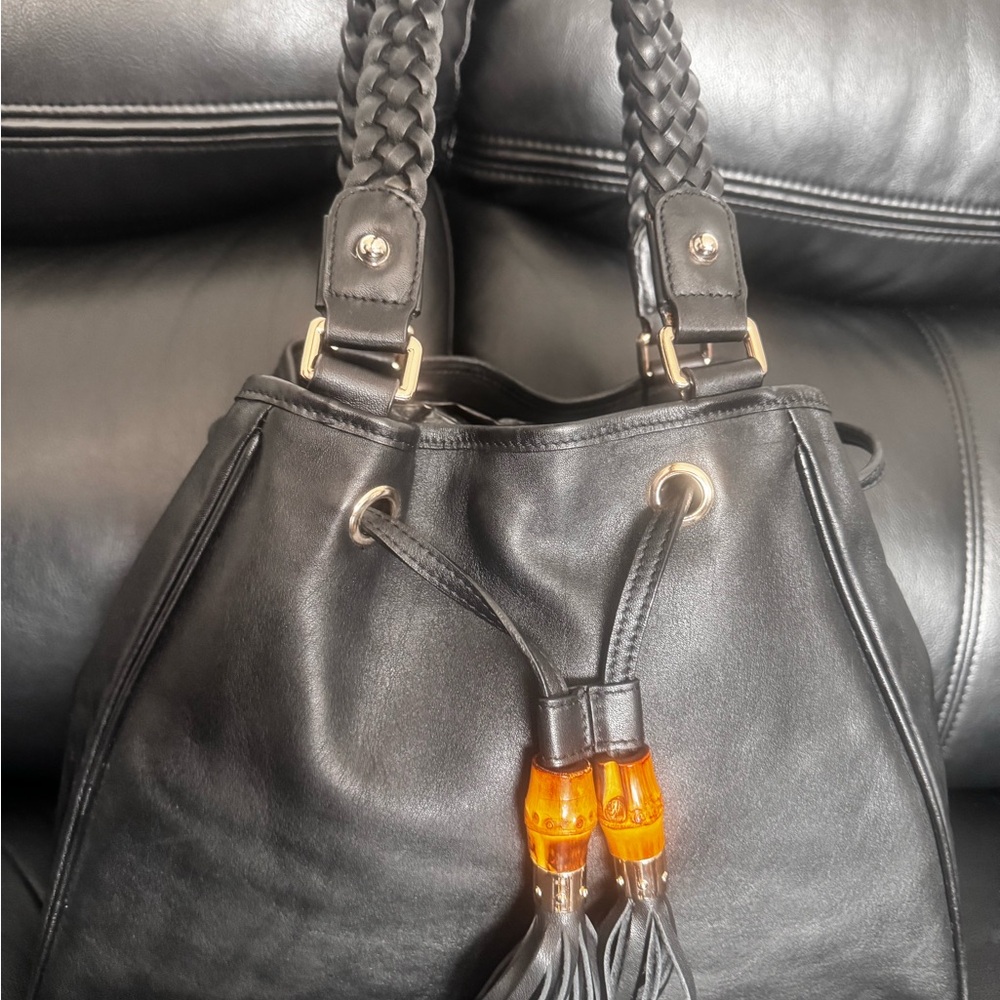 Elegant Black Leather Shoulder Bag with Orange Tassels Vintage Gucci Bamboo